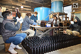 Bottling, inspection, and labeling are all carried out by hand